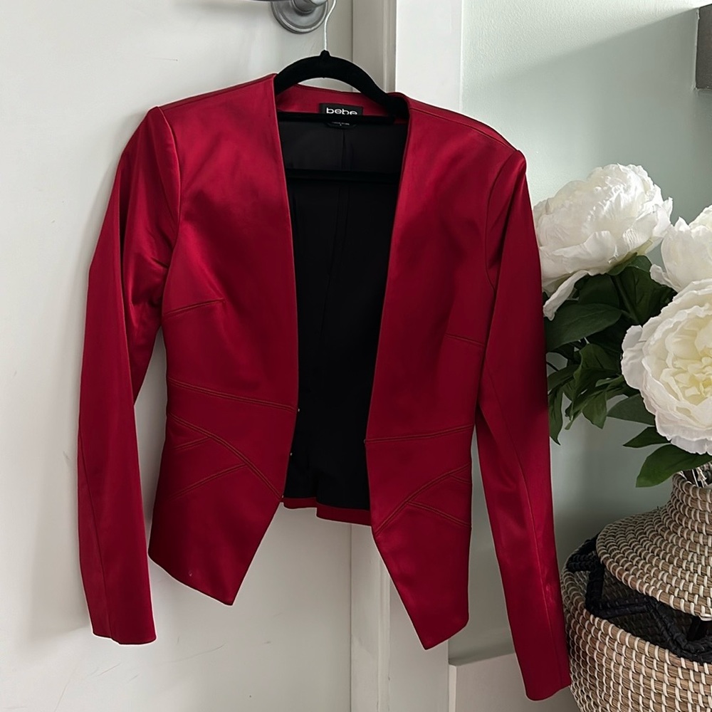 Bebe red crop blazer in size XS